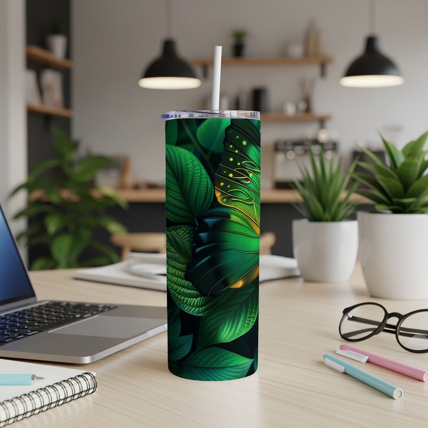 Green butterfly and leaves pattern on a white tumbler with straw.