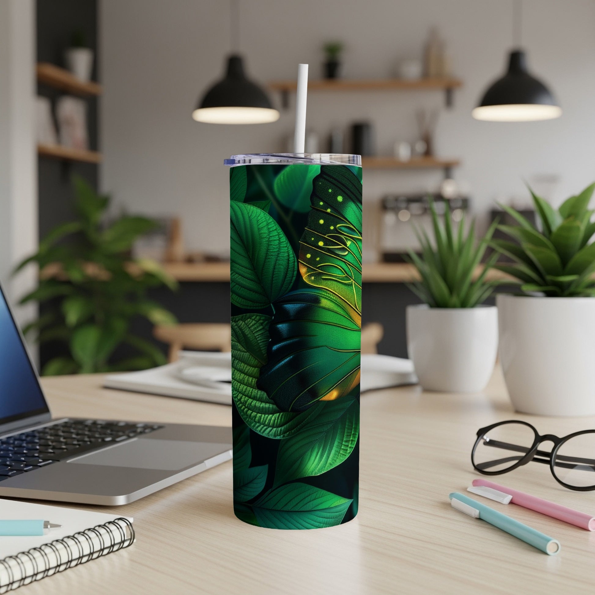 Green butterfly and leaves pattern on a white tumbler with straw.