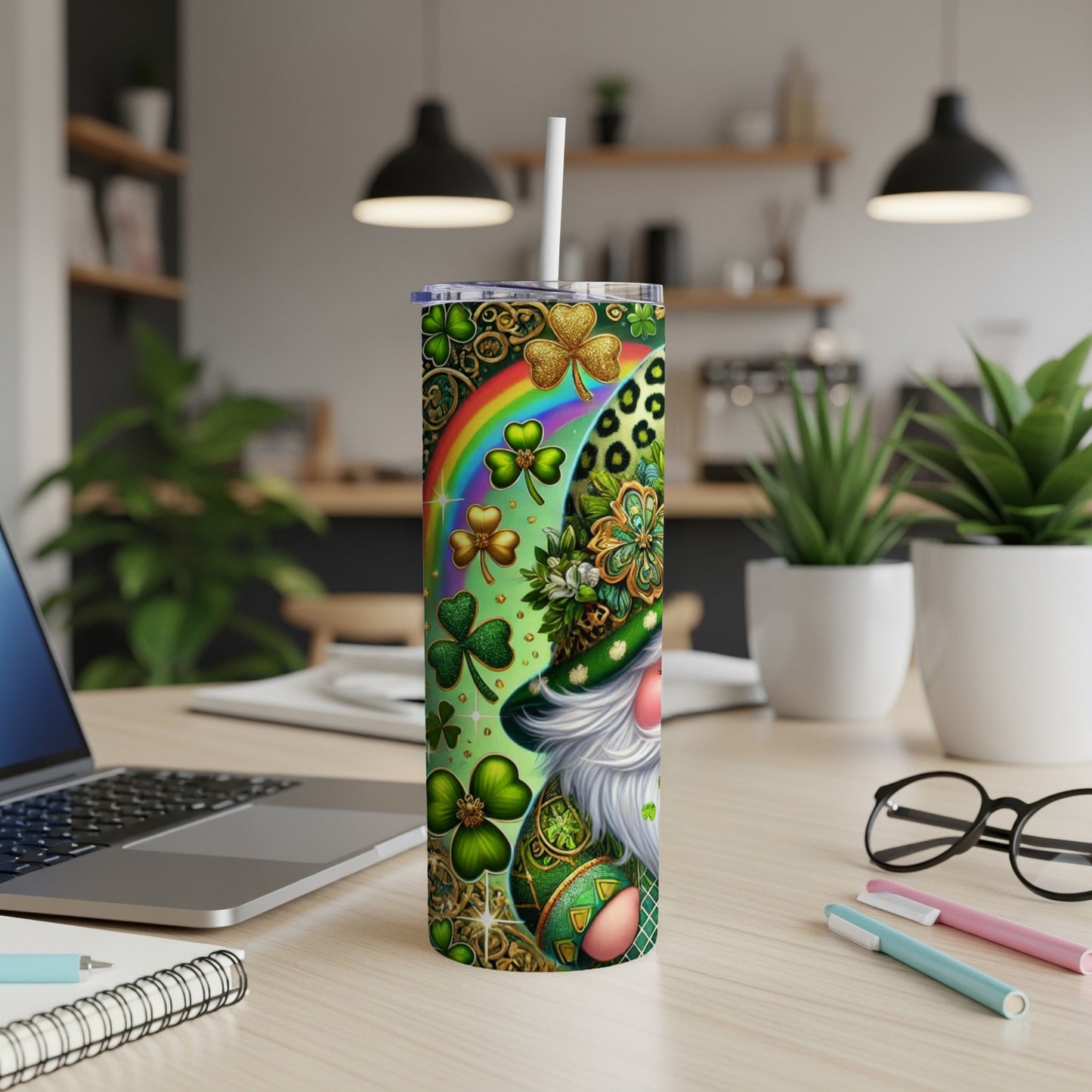Green gnome with shamrocks and rainbow on a patterned tumbler.