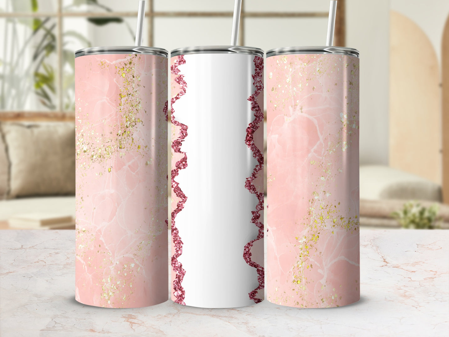 Three tall tumblers with a pink marble and gold glitter design.