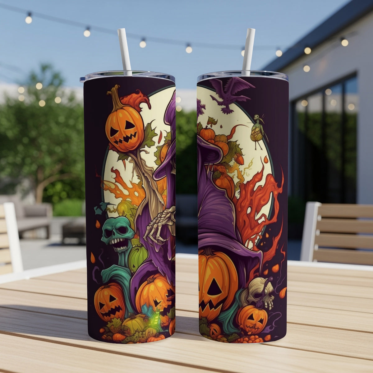 Two tumblers with a Halloween design featuring pumpkins, a witch, skulls, and flames.