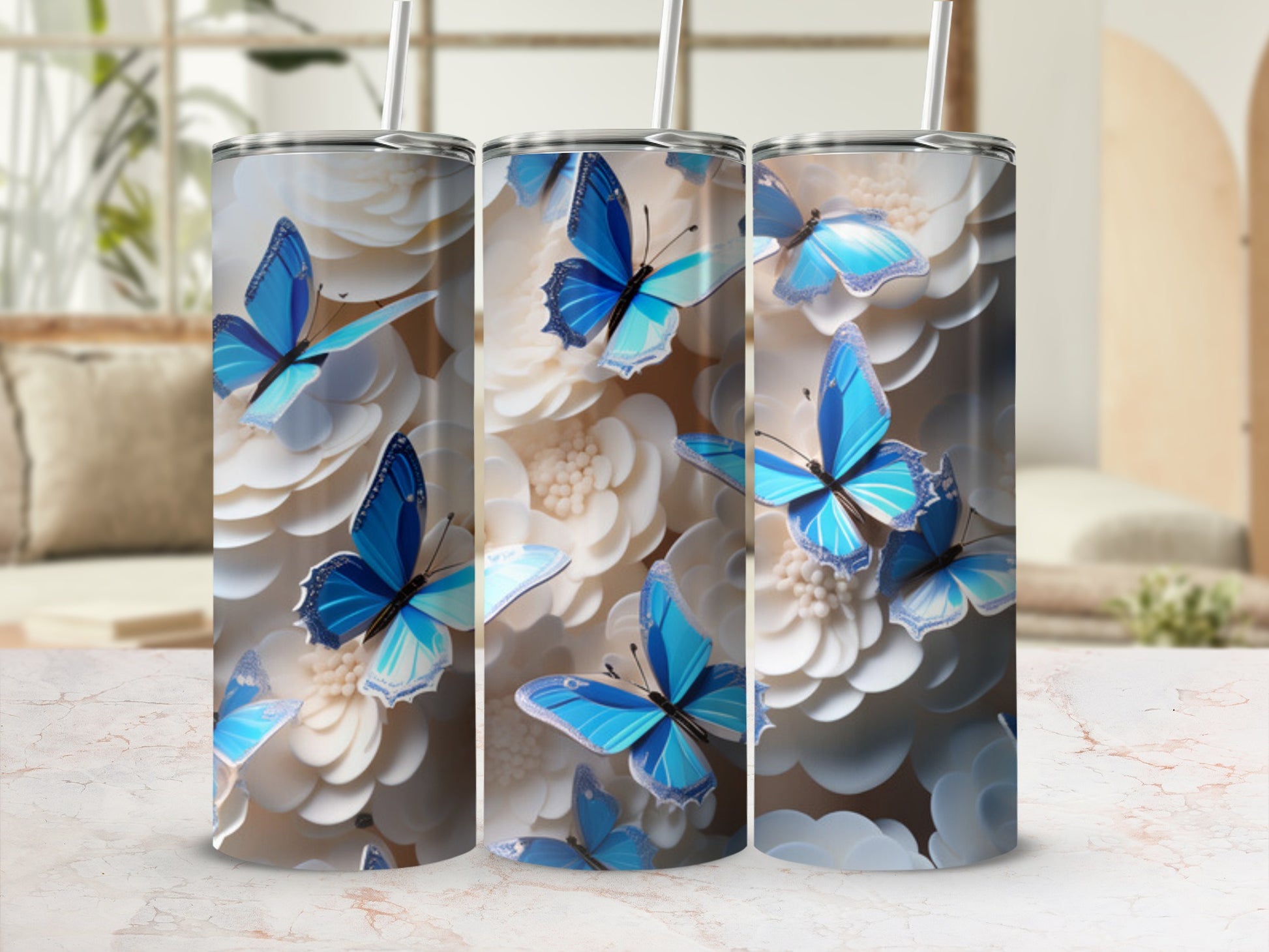 Tumbler with blue butterflies and white flowers.