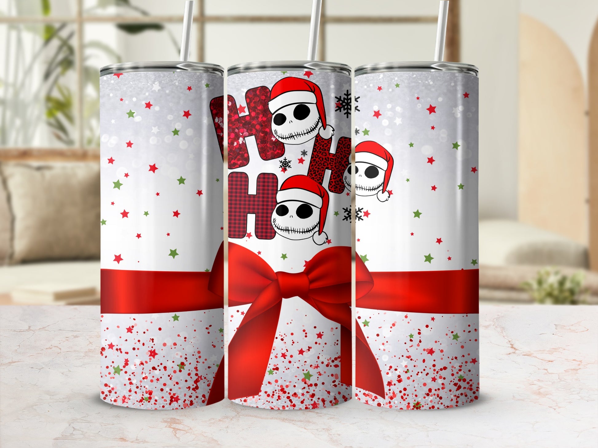 White tumbler with red ribbon and Jack Skellington "Ho Ho Ho" Christmas pattern.
