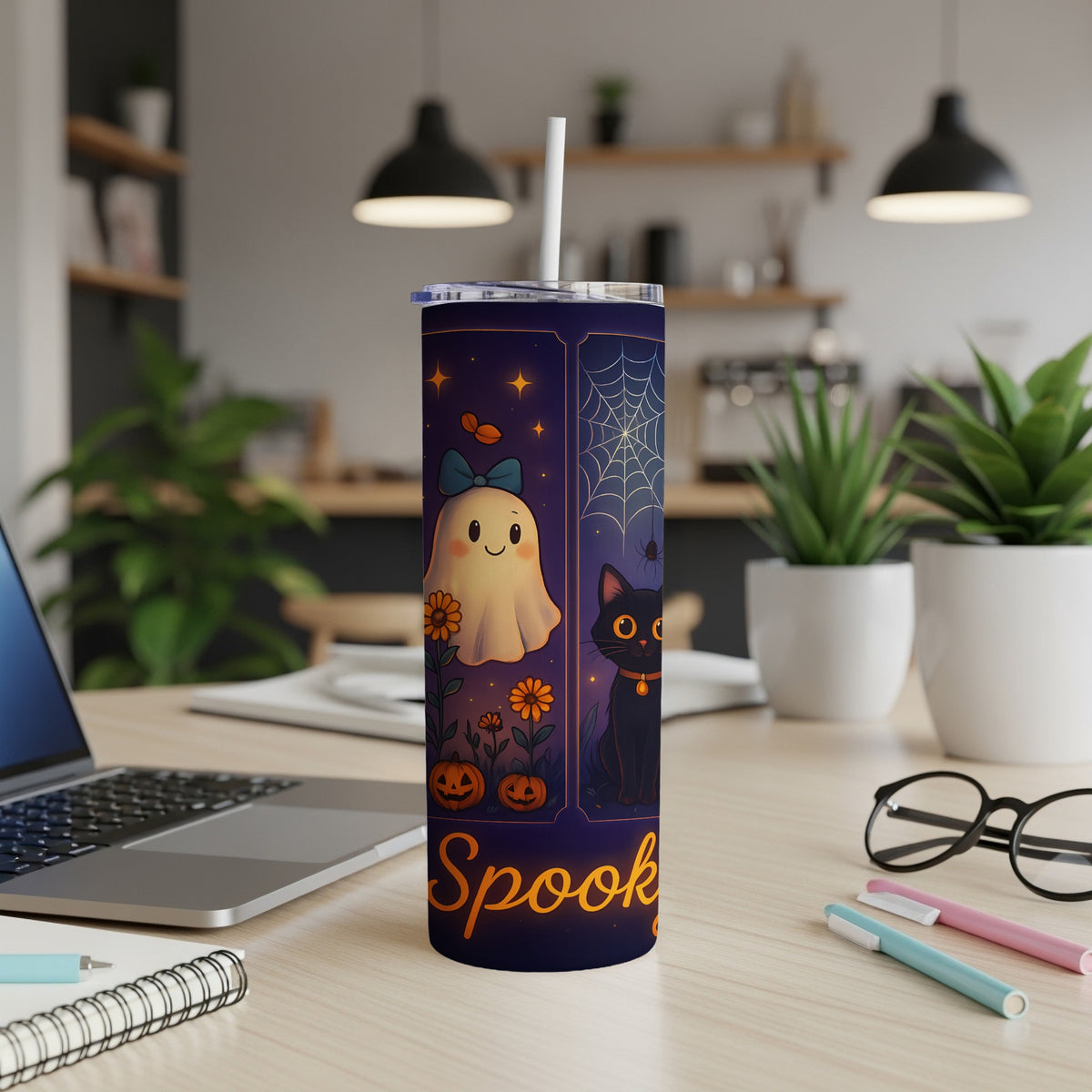 Halloween tumbler with a ghost, black cat, pumpkins, and "Spooky" text.