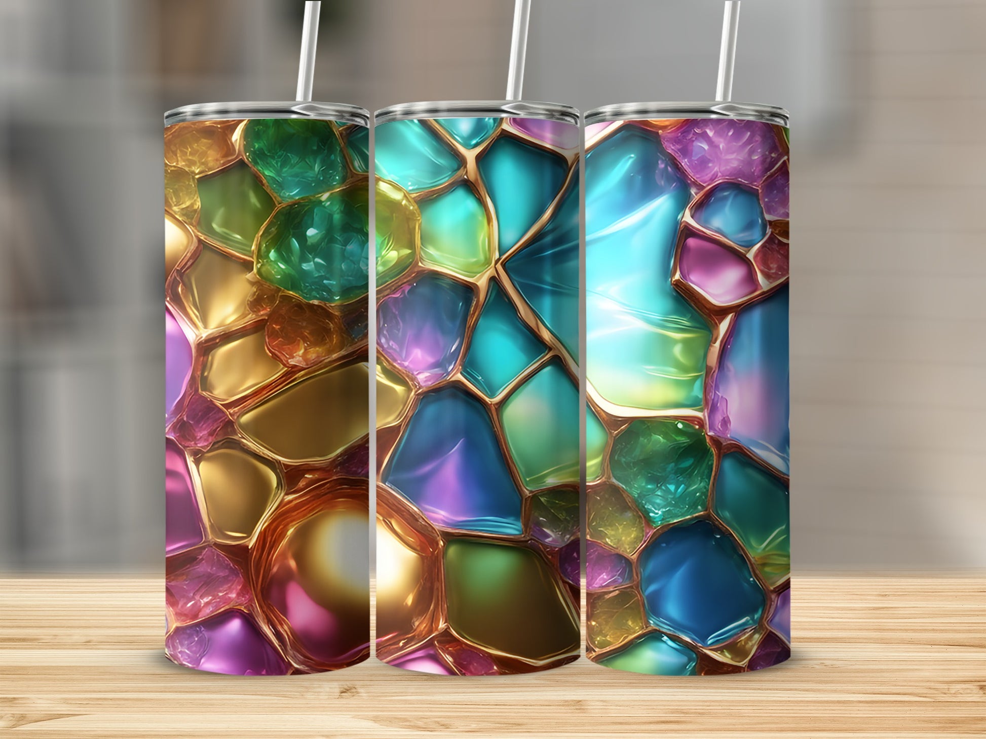 Three tumblers with stained glass mosaic designs in jewel tones.