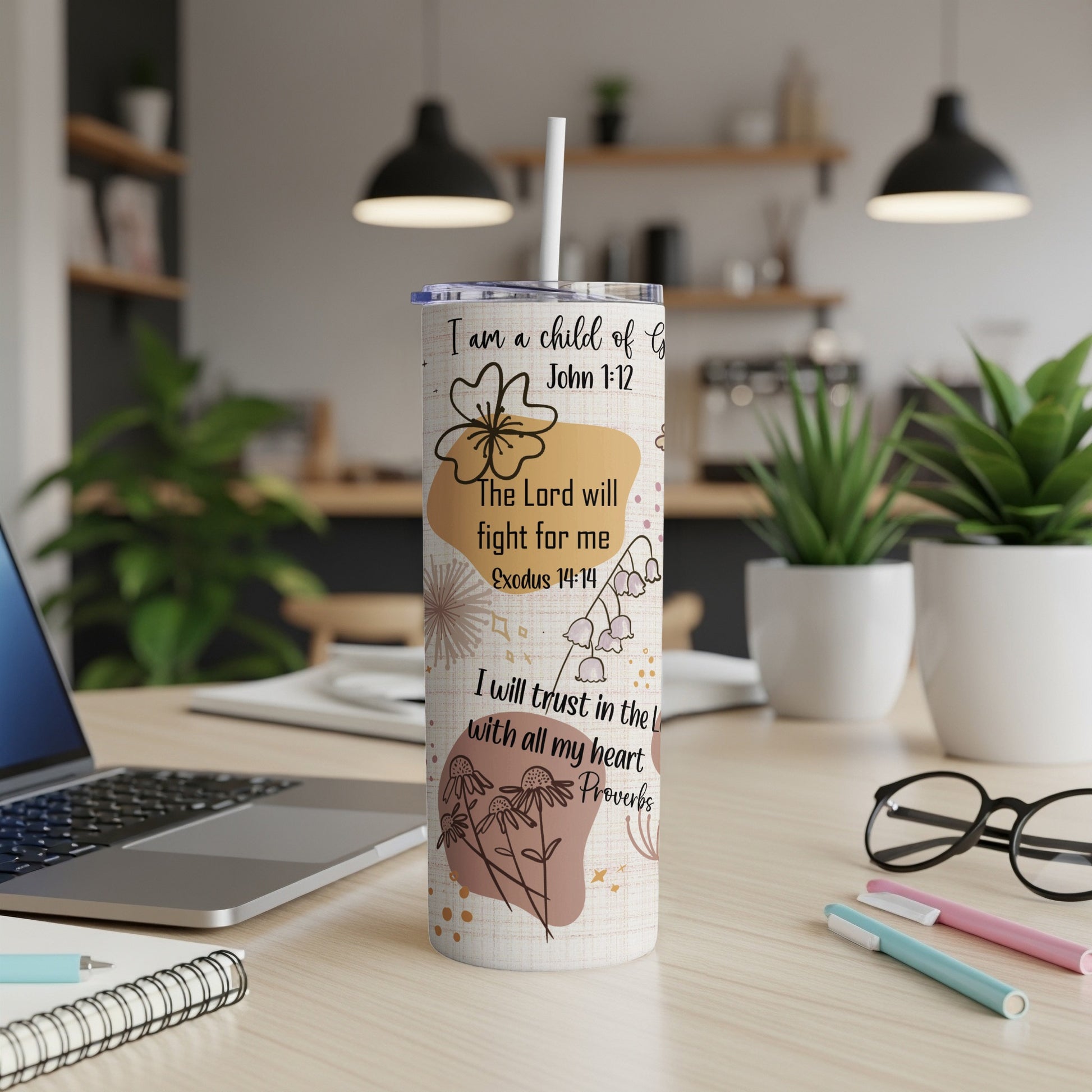 White tumbler with floral design and scripture, "I am a child of God John 1:12".