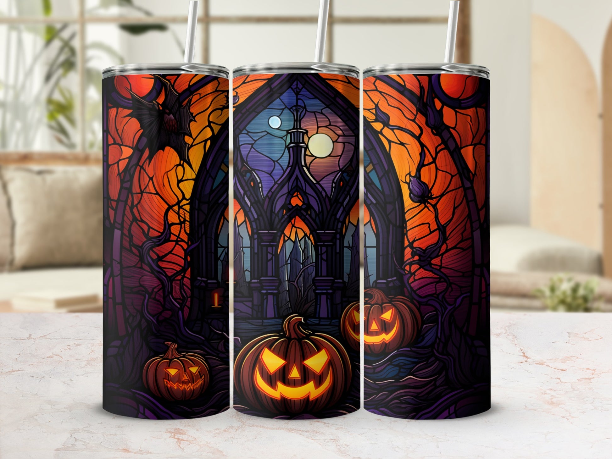 Three Halloween tumblers with glowing pumpkins and spooky stained-glass castle scenes.