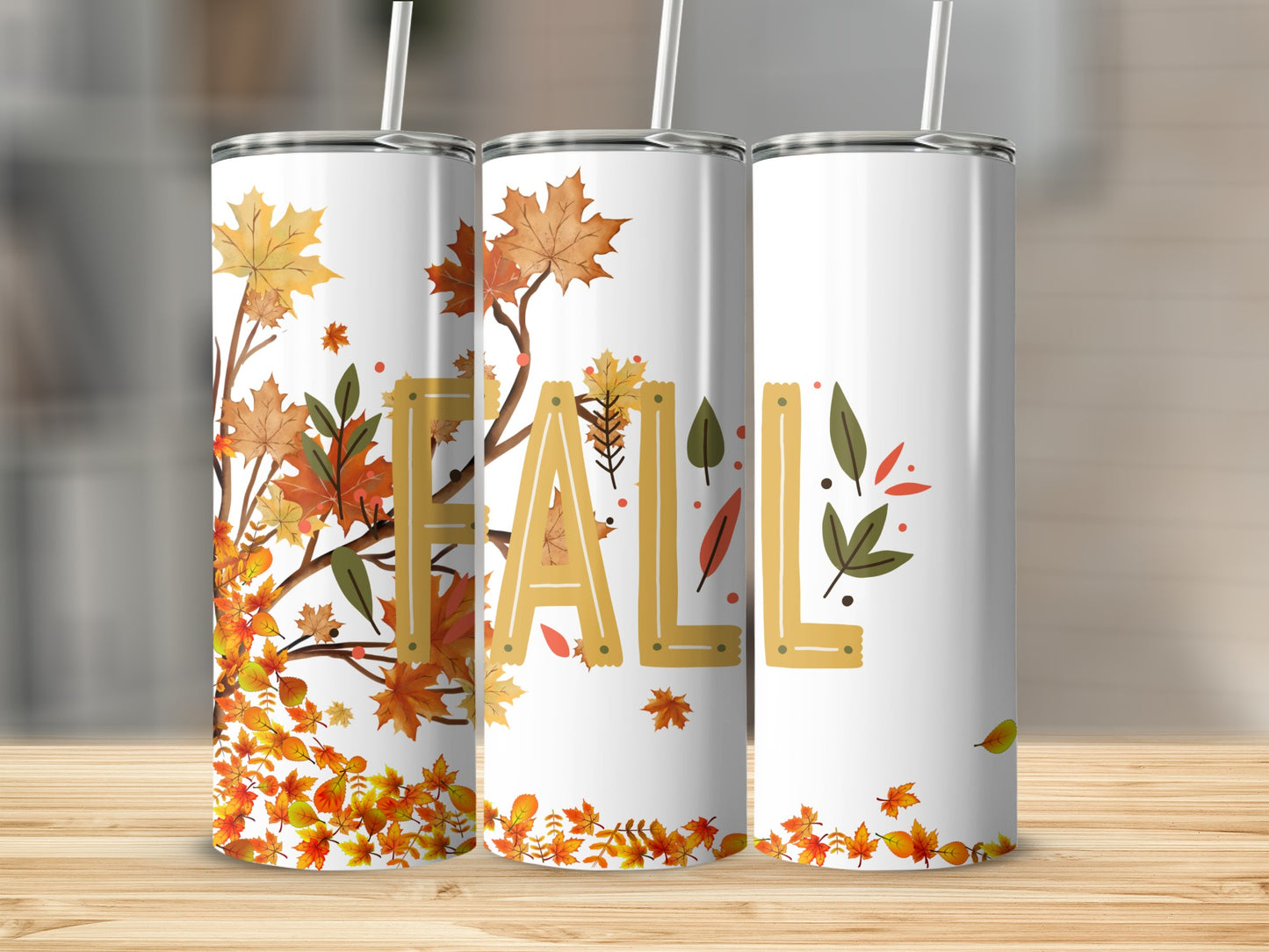 Three white tumblers with fall leaf and "FALL" text designs.
