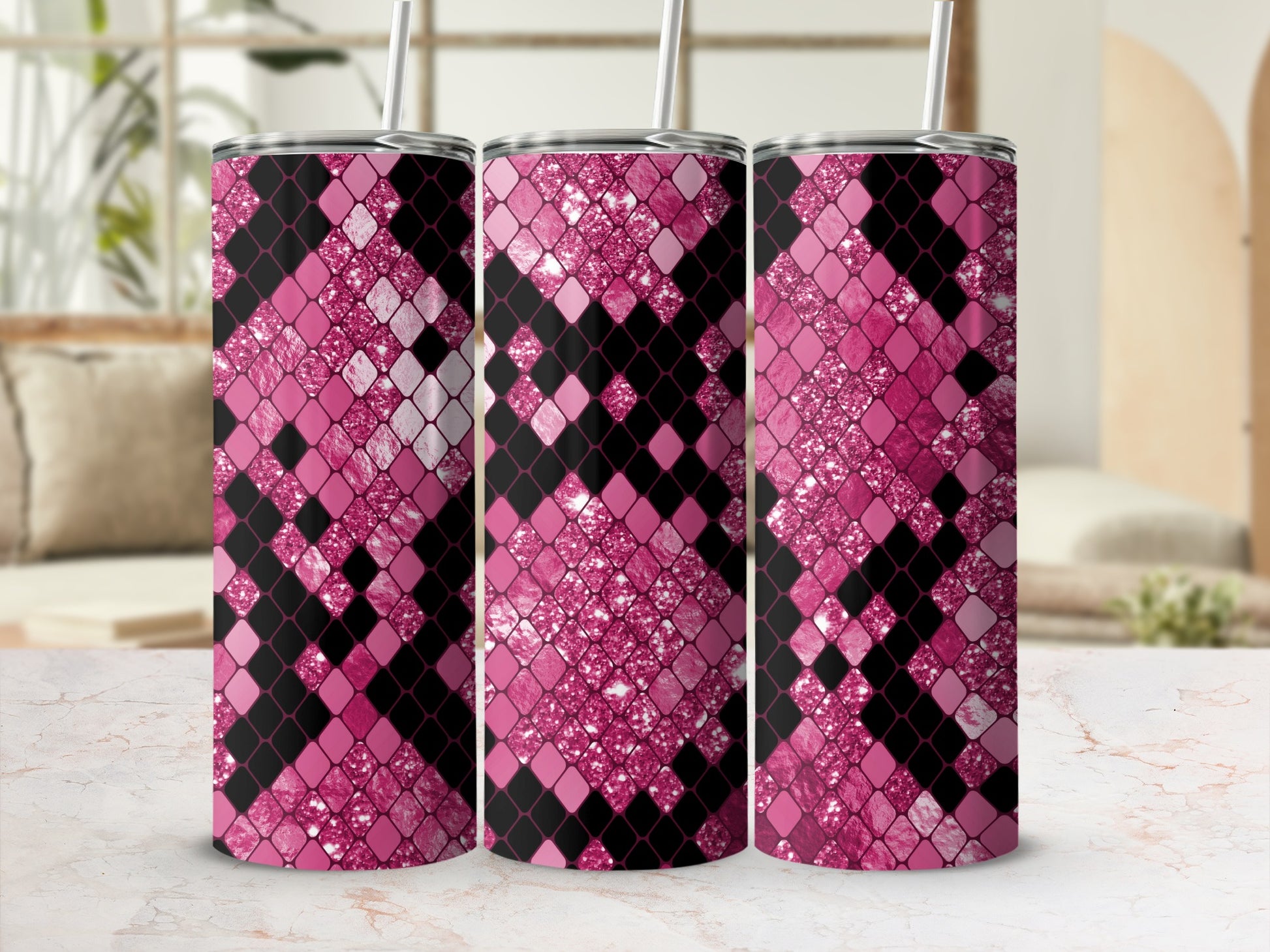 Three tumblers with a pink and black diamond scales pattern and glitter accents.