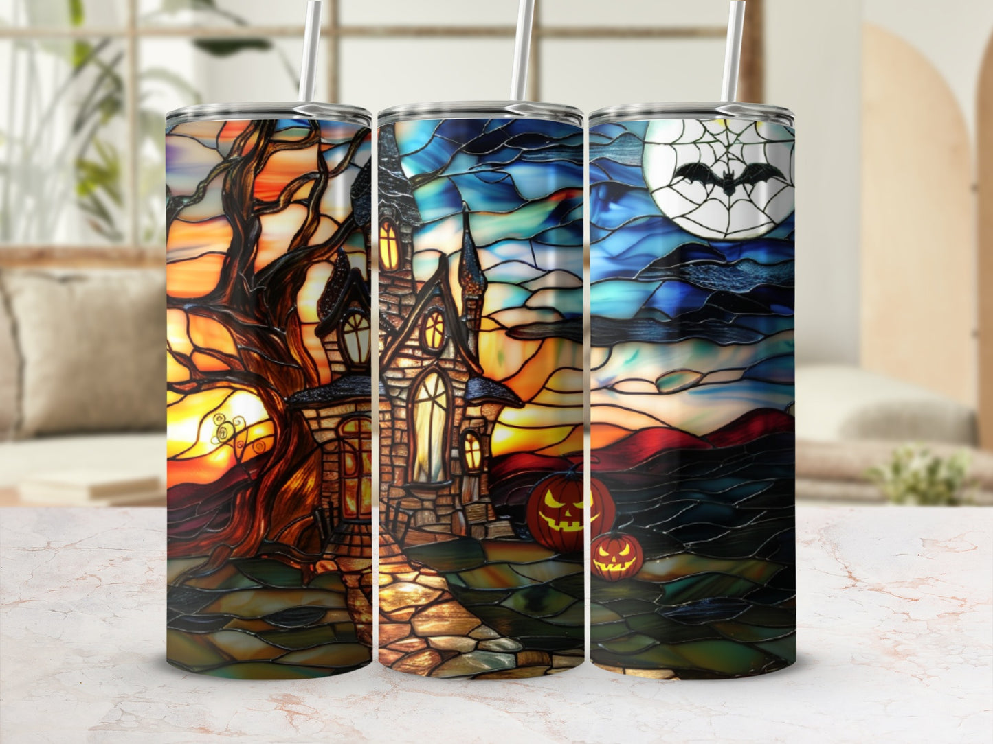 Three tumblers with stained-glass Halloween scenes: haunted house, pumpkins, moon.