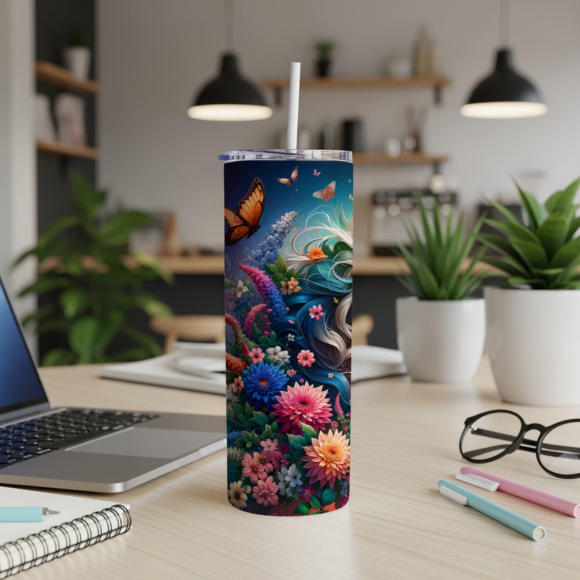 Tumbler with a colorful floral and butterfly design.