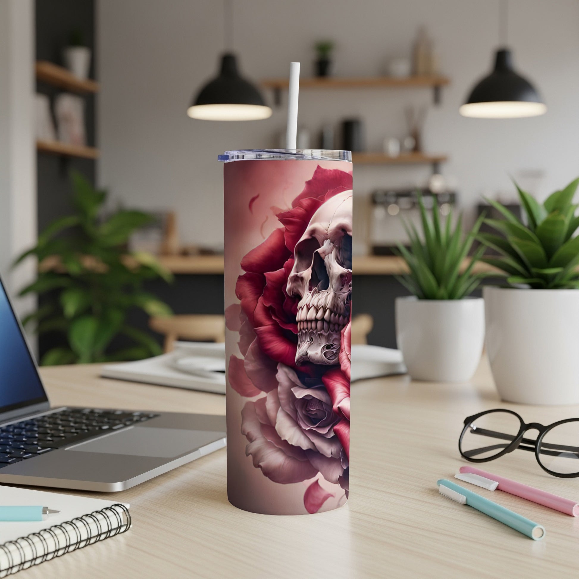 Tall tumbler with skull and red roses design.