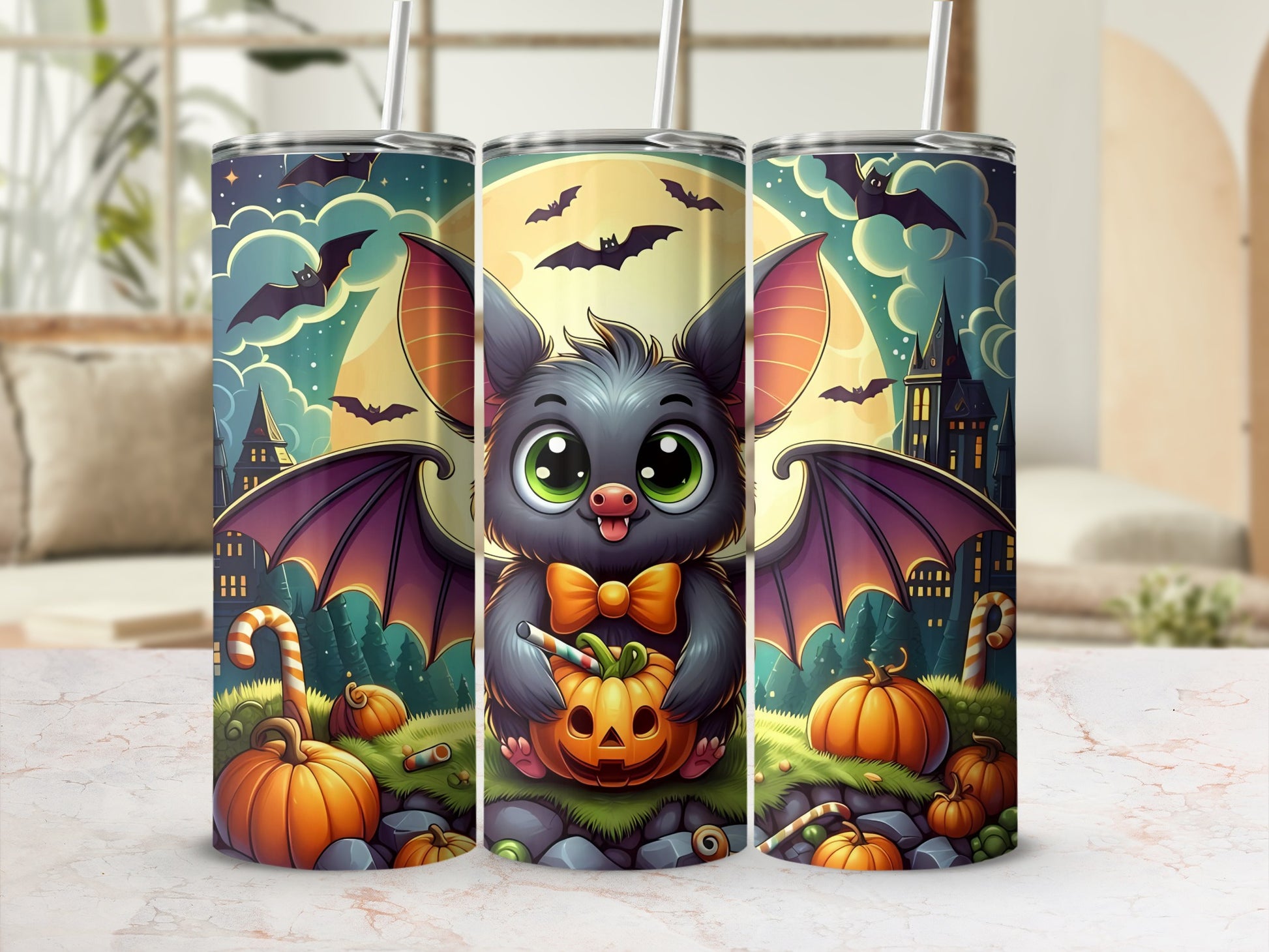Three tumblers featuring a cute bat holding a jack-o'-lantern on a Halloween night.
