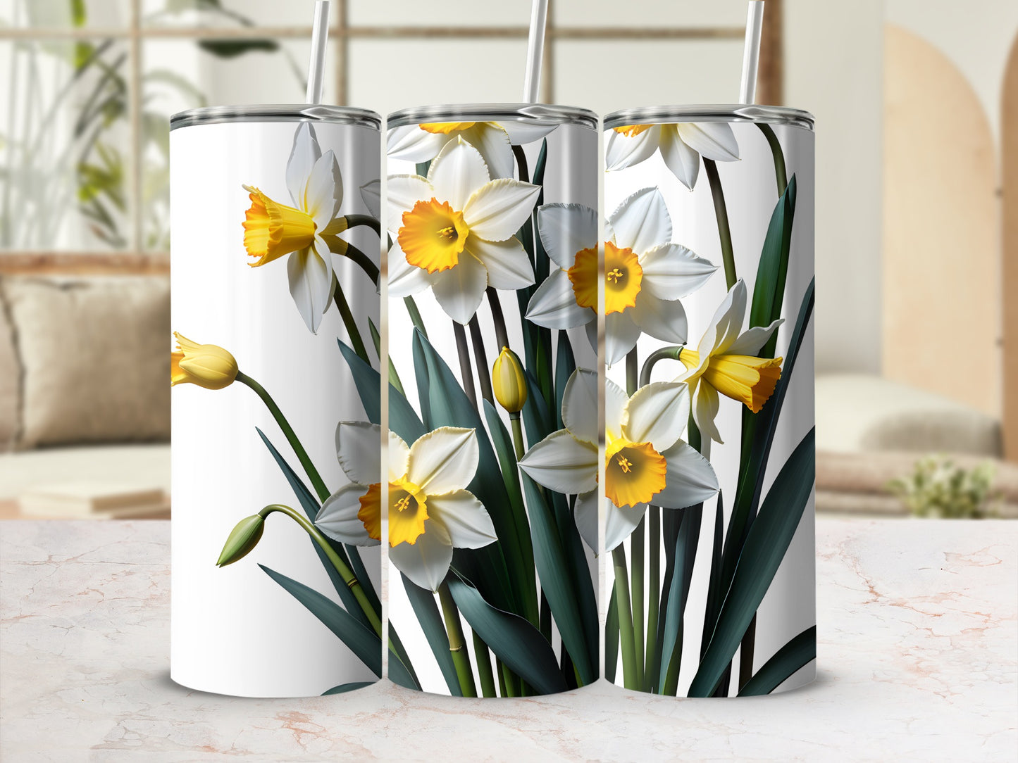 Three tumblers with a watercolor daffodil floral design.