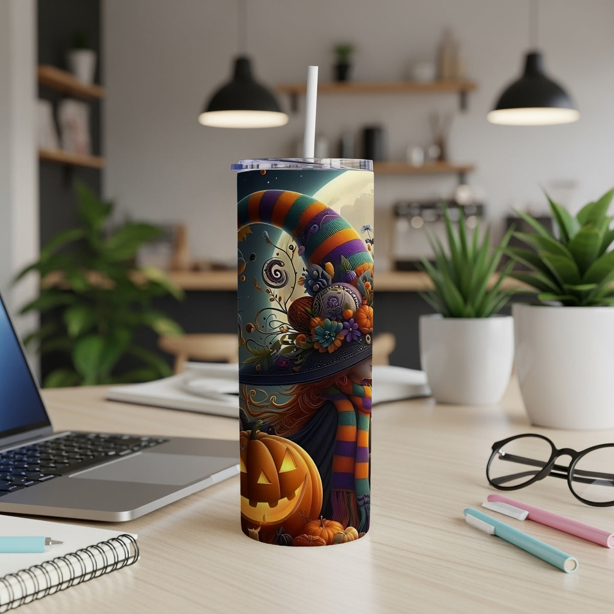 Halloween themed tumbler with witch, pumpkin, and crescent moon artwork.