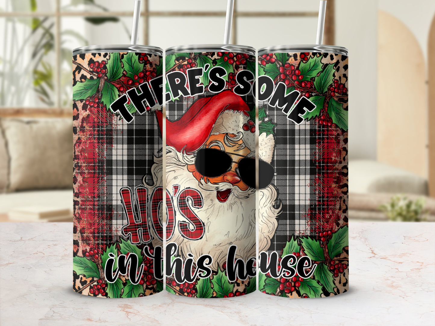 Santa Claus with sunglasses and text "THERE'S SOME HO HO HO'S in this house" on tumbler.