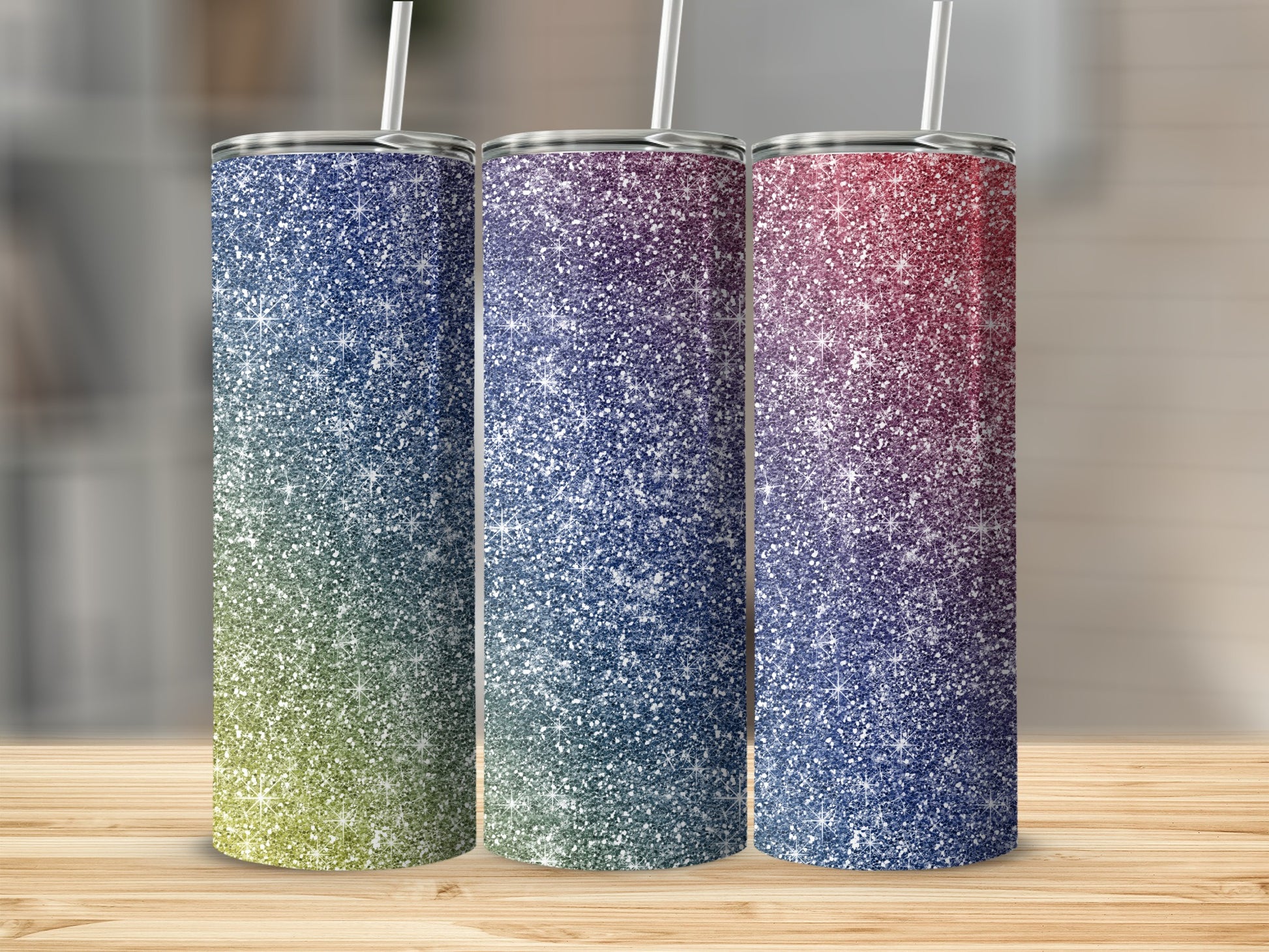Three glitter tumblers with blue, purple, and red gradient patterns.