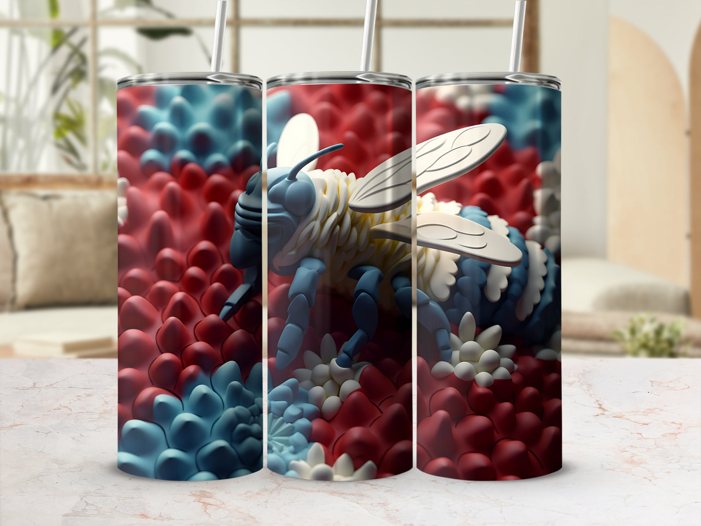 Three tumblers with a blue and white bee design on a red and blue textured background.