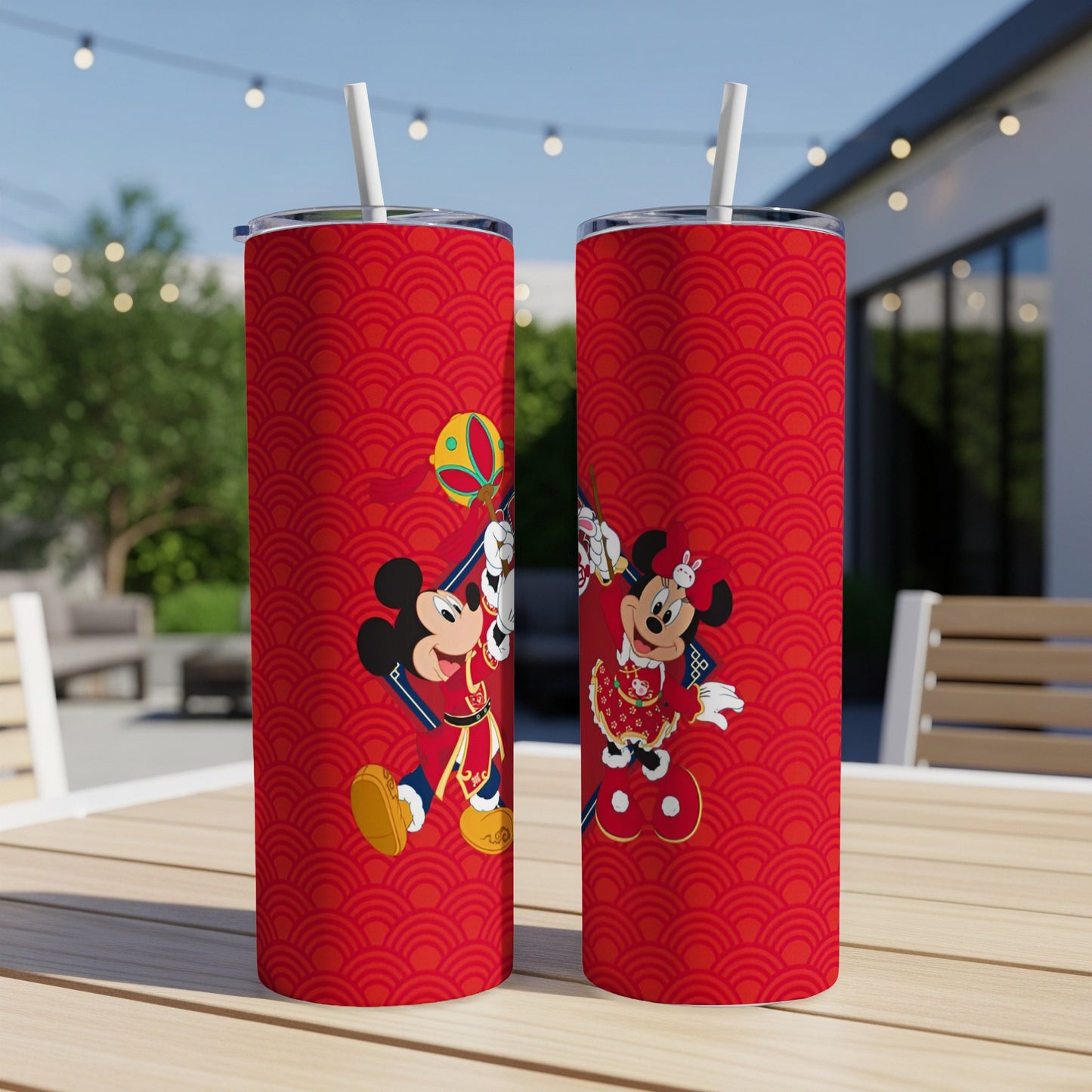 Mickey and Minnie Mouse in festive red outfits on red patterned tumblers.