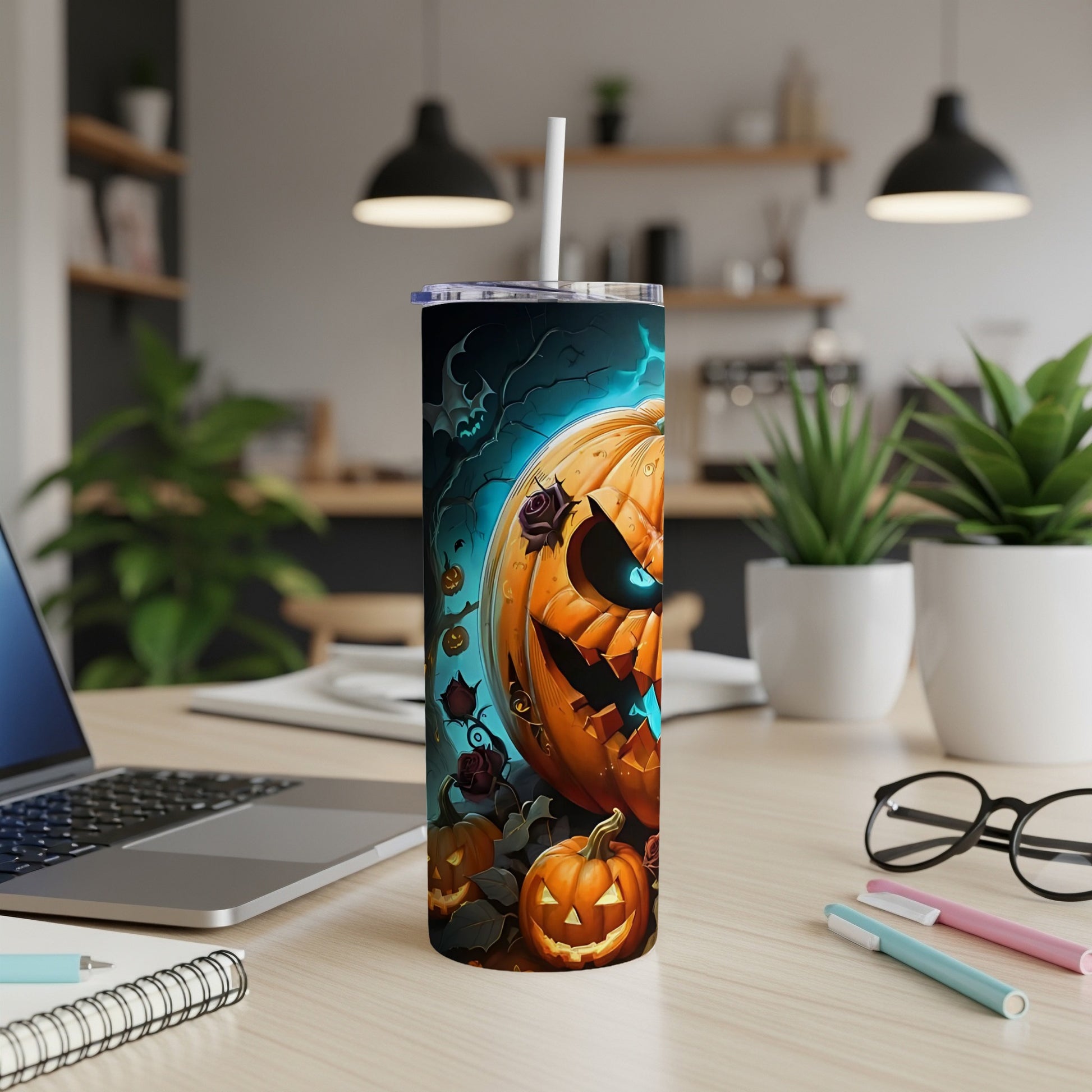 Tumbler with a spooky Jack-o'-lantern and pumpkin design, featuring bats and dark roses.