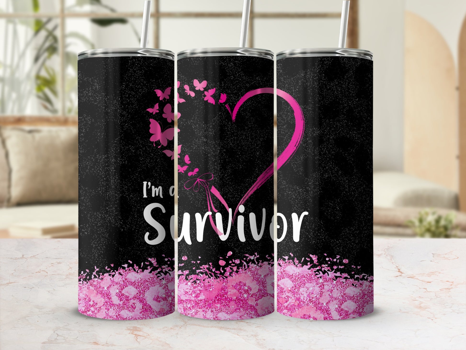 Black tumbler with pink heart, butterflies, and "I'm a Survivor" text.