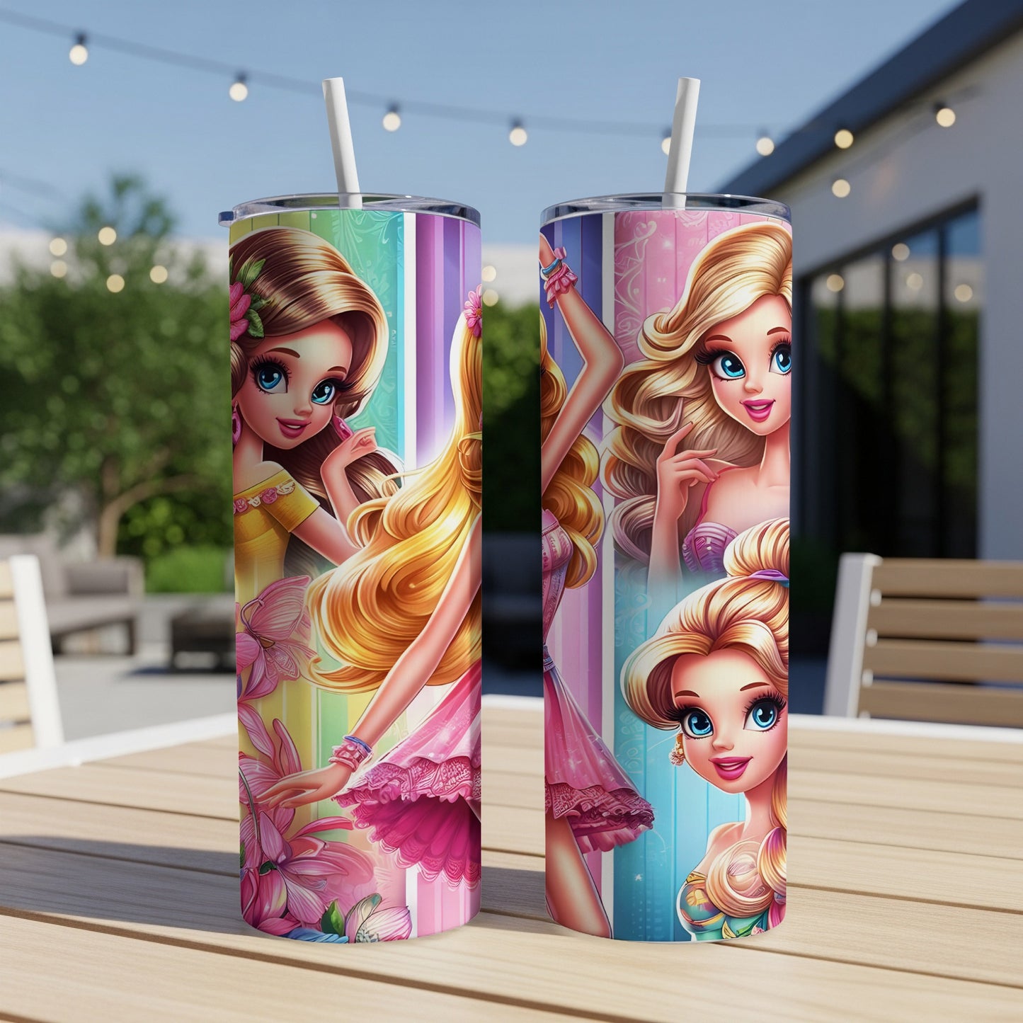 Two Barbie-themed tumblers with colorful designs and straws on a table.