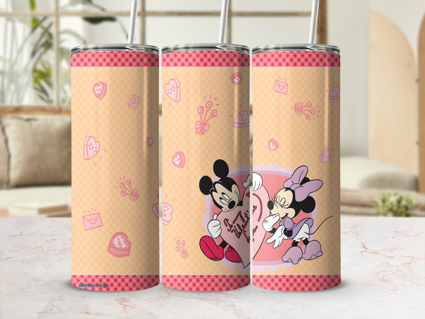 Disney Mickey and Minnie Mouse Valentine's Day tumbler with hearts and envelopes.