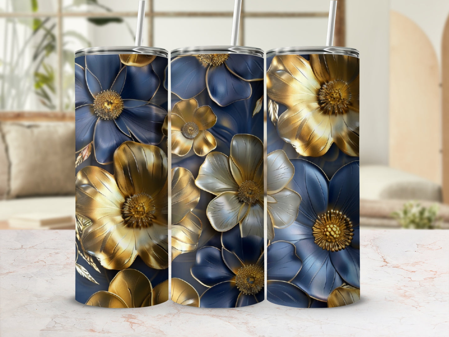Three tumblers with a dark blue and gold floral design.