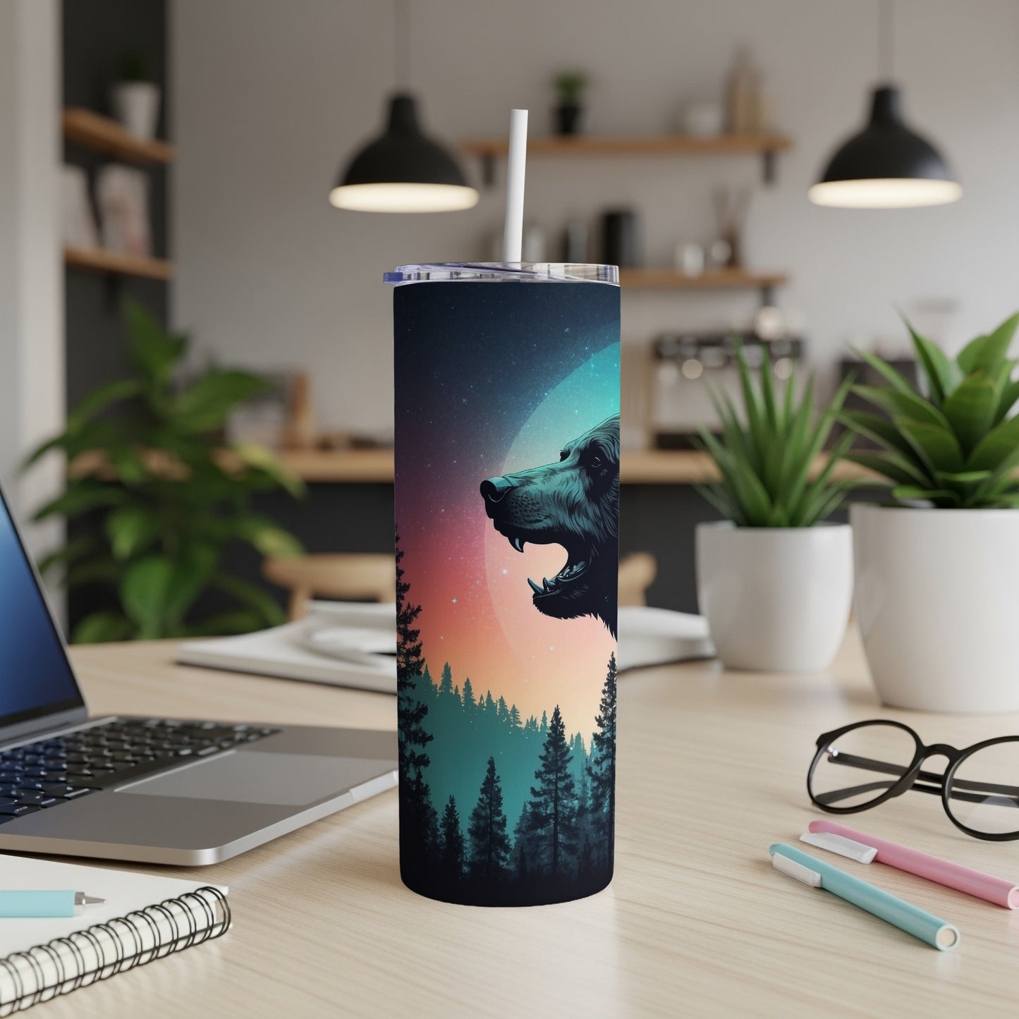 Wolf and moon on a tumbler with trees in silhouette.