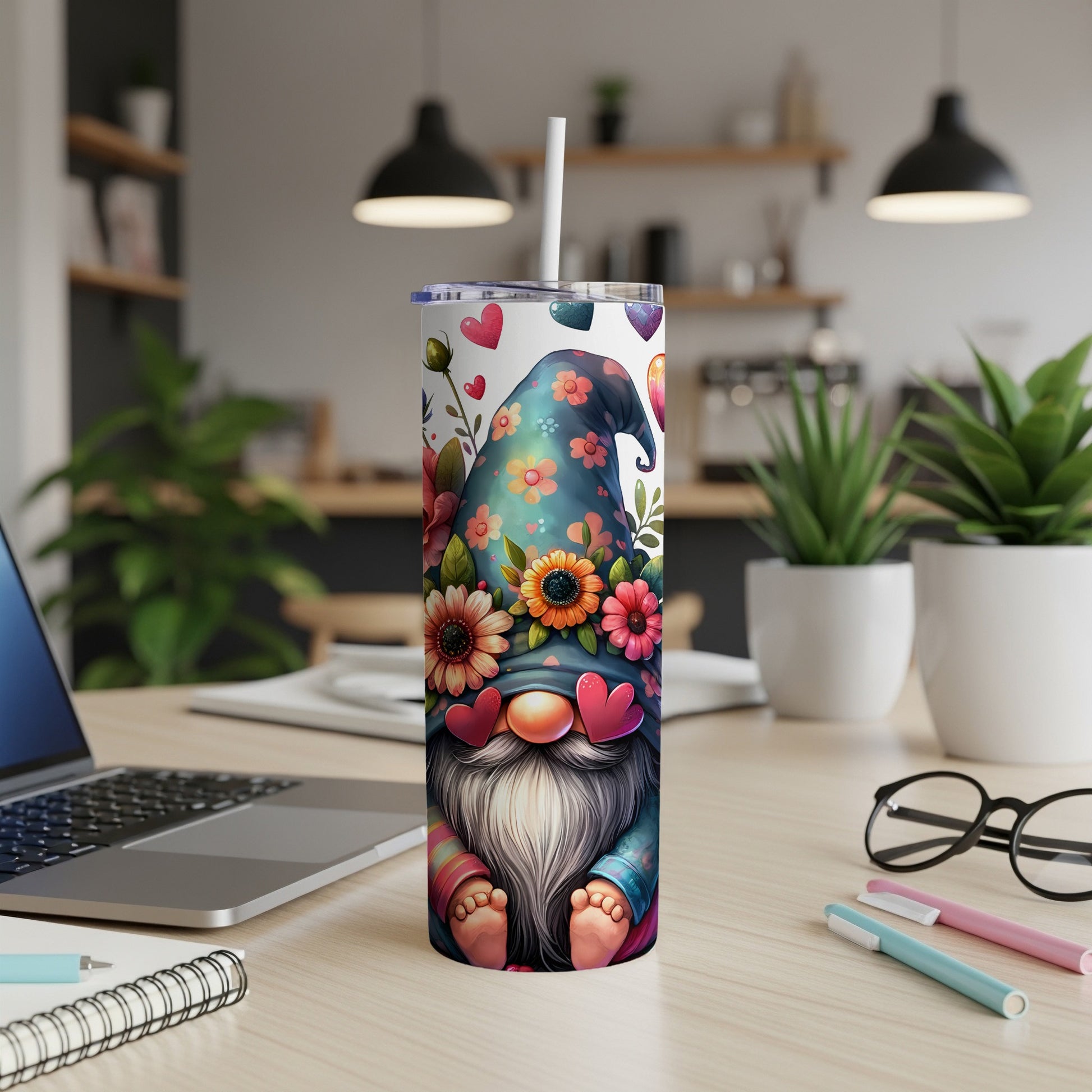 Gnome with floral hat and heart sunglasses on a colorful skinny tumbler.