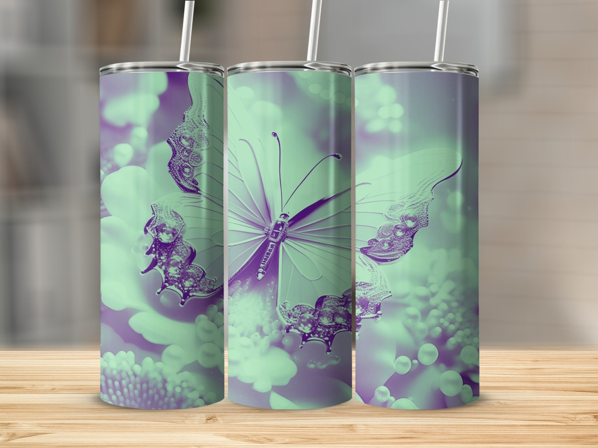 Three tumblers with a purple butterfly and floral design.