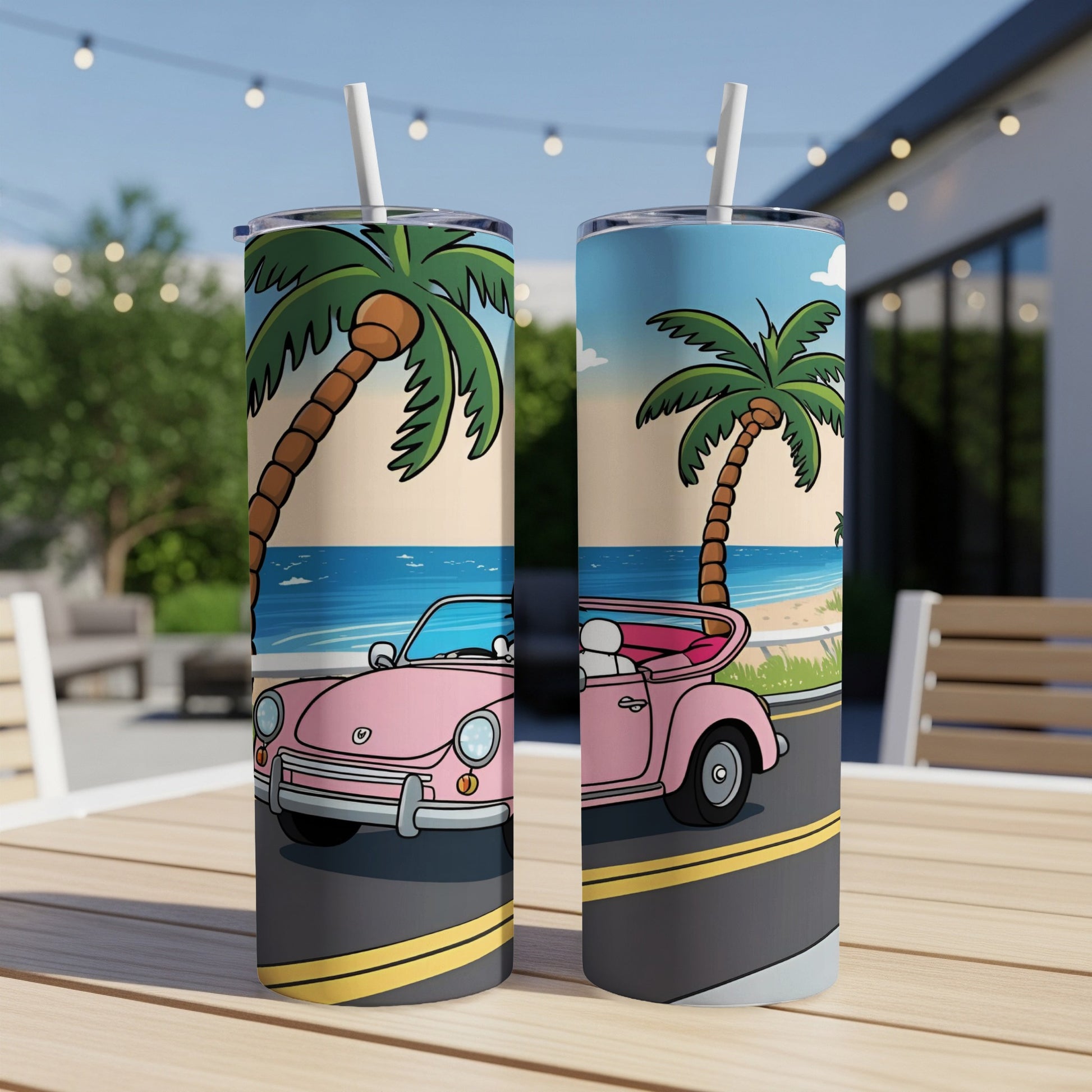 Pink convertible car on a beach road with palm trees and ocean.