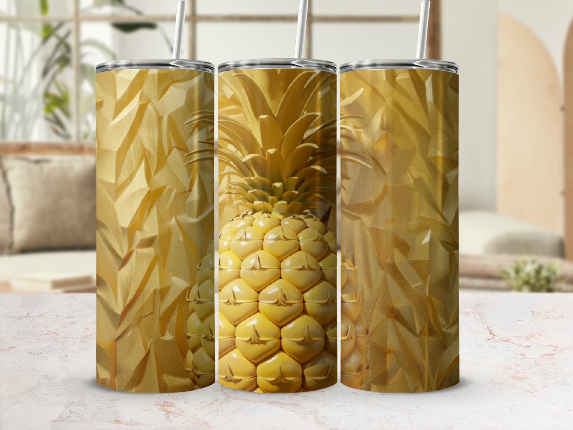 Gold pineapple pattern on three seamless tumblers with straws.