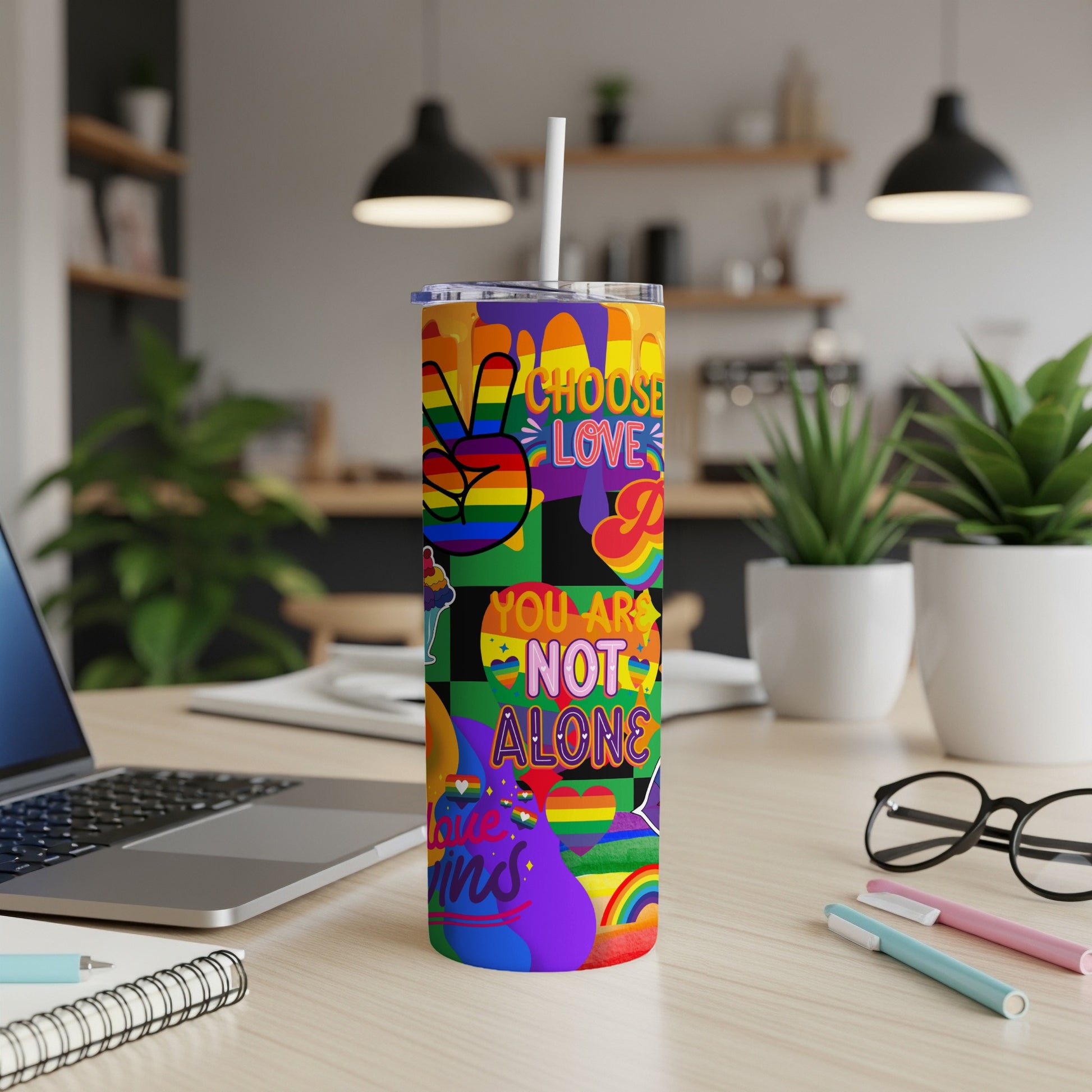 Rainbow and peace sign tumbler with "Choose Love" and "You Are Not Alone" text.