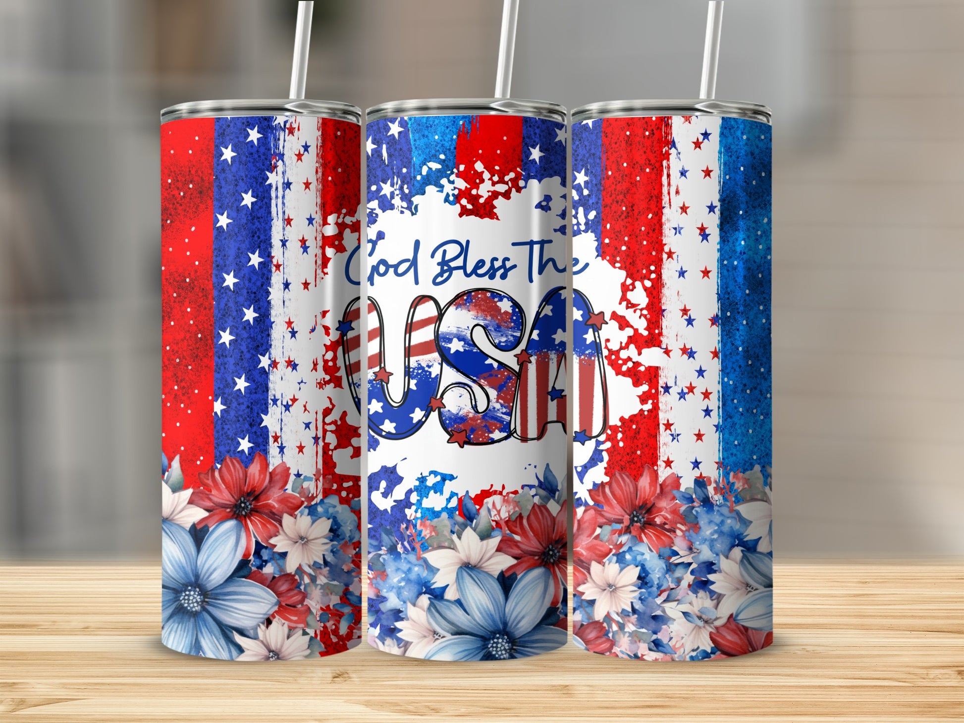 Three tumblers with patriotic USA design and floral accents.