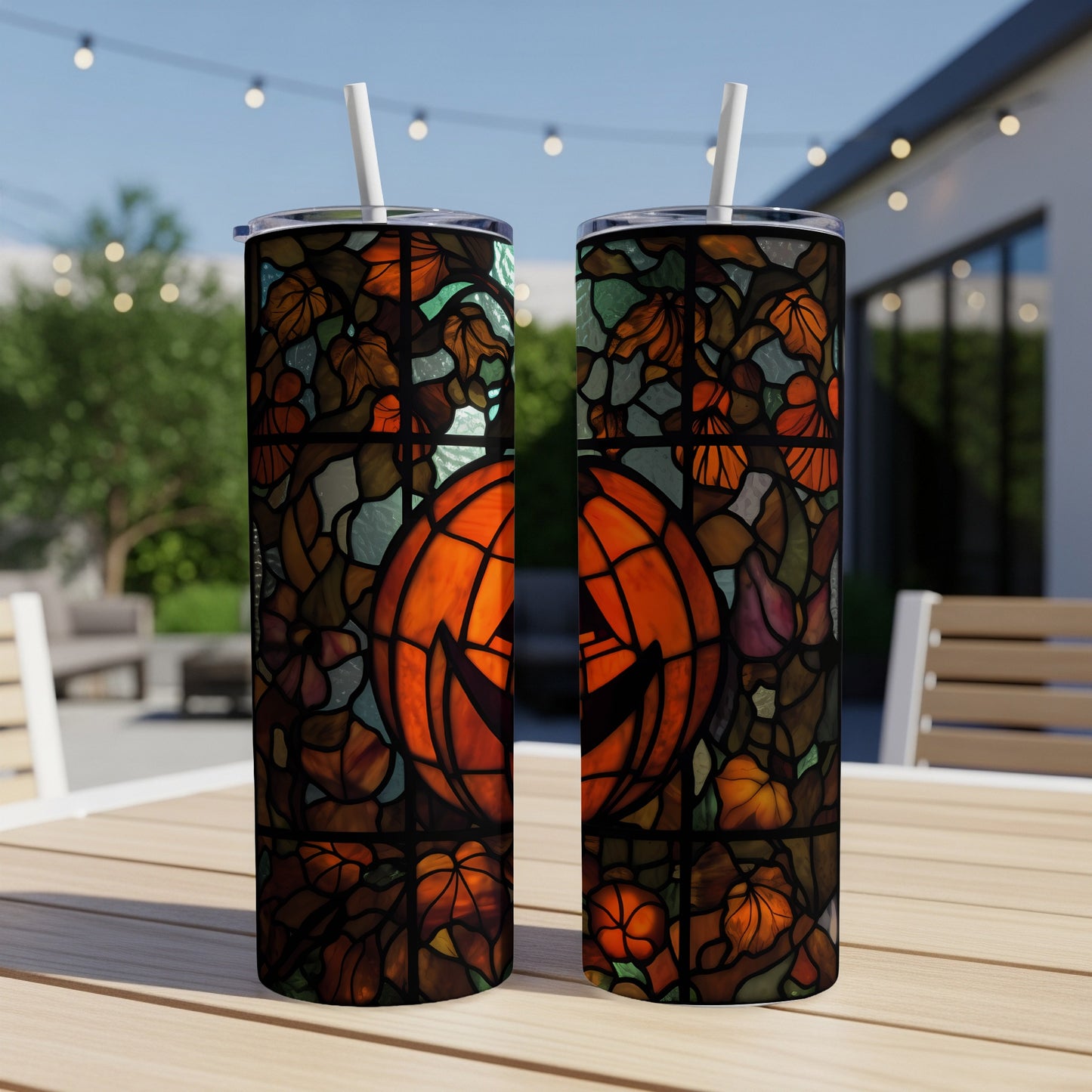Two tumblers with stained-glass Halloween pumpkin design.