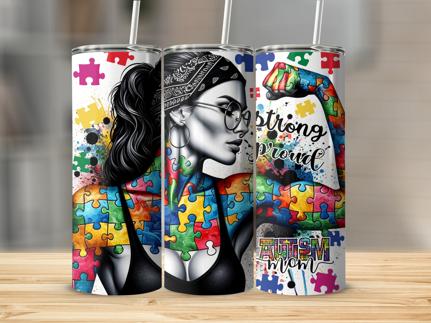 Autism mom strong proud tumbler with colorful puzzle piece artwork.