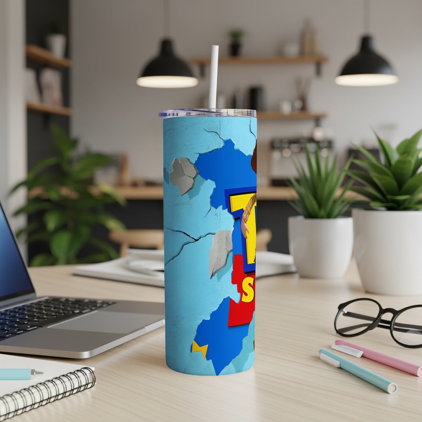 Blue tumbler with "Toy Story" logo and crackled wall design.