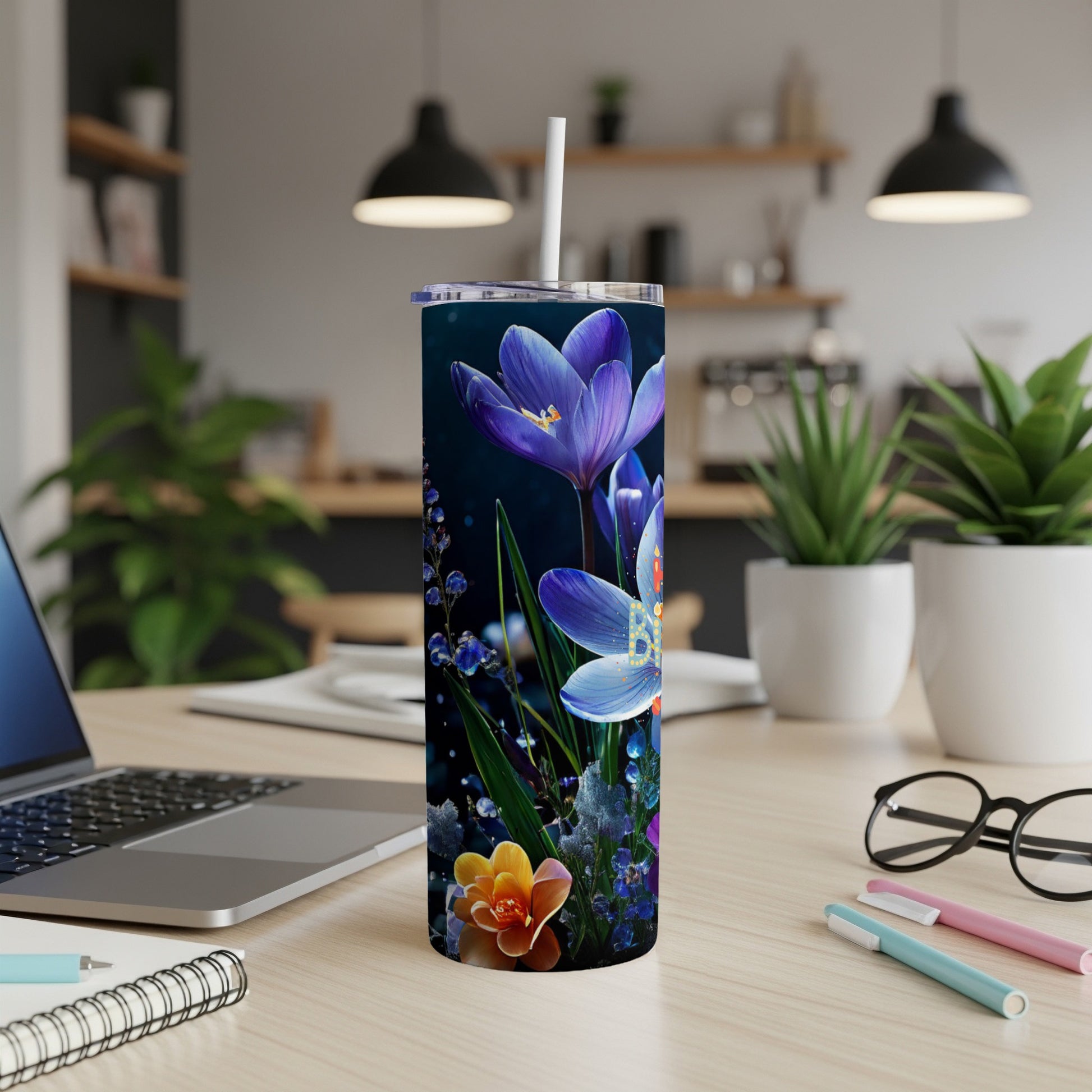 Purple and orange flowers on a dark blue background, on a white tumbler.