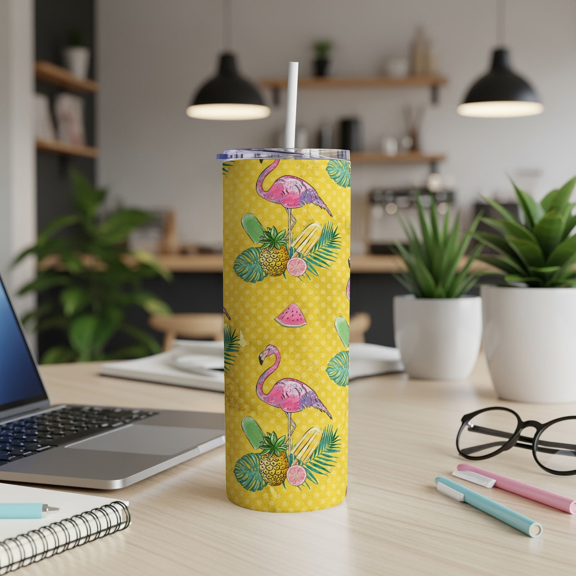 Yellow tumbler with flamingos, pineapples, and watermelon slices.