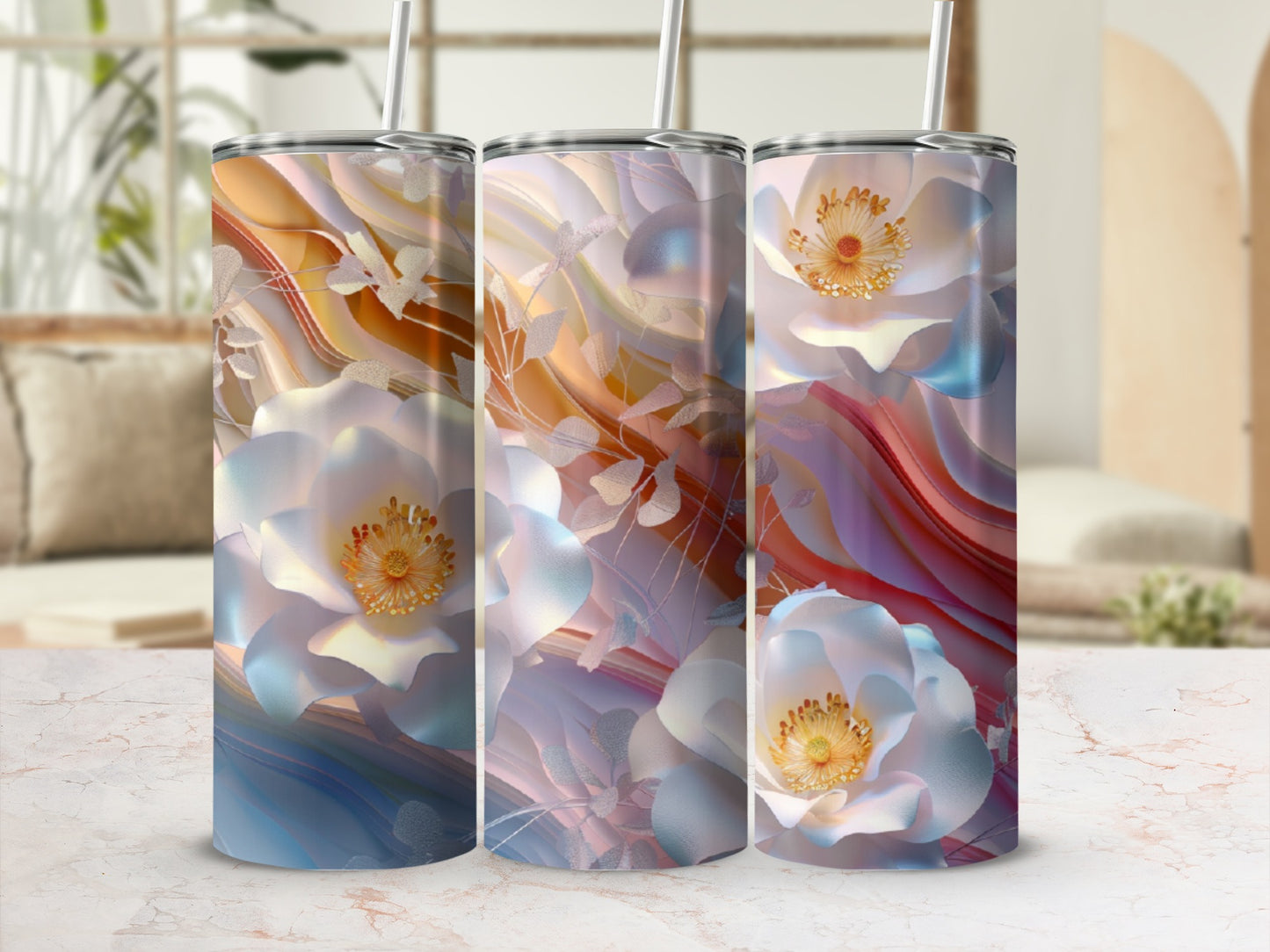 Three tumblers with white flowers and abstract colorful swirling backgrounds.