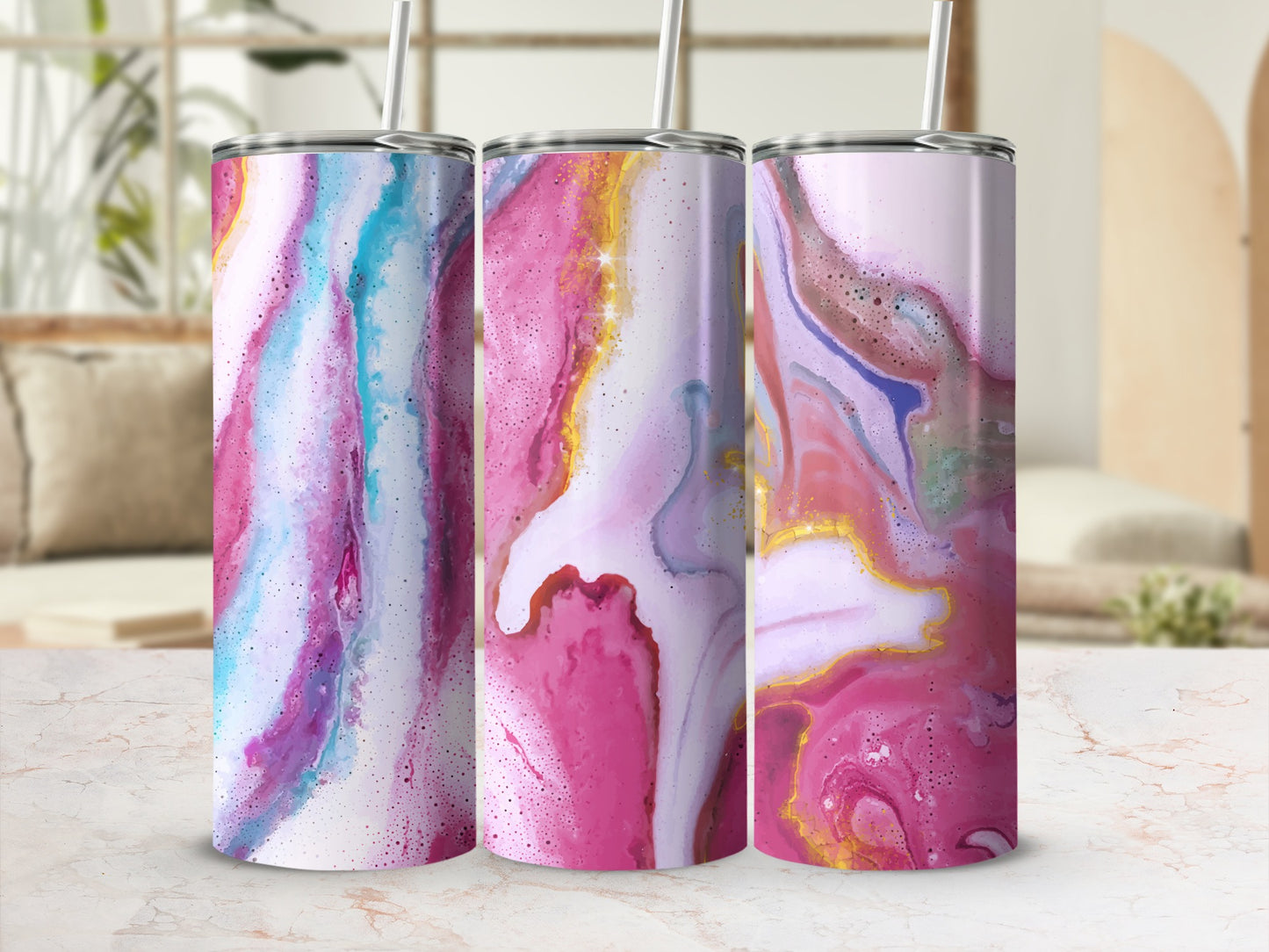 Three tumblers with colorful abstract marble patterns in pinks, blues, and golds.