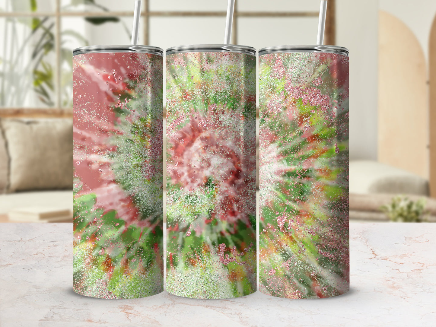 Three tumblers with a pink and green tie-dye glitter design.
