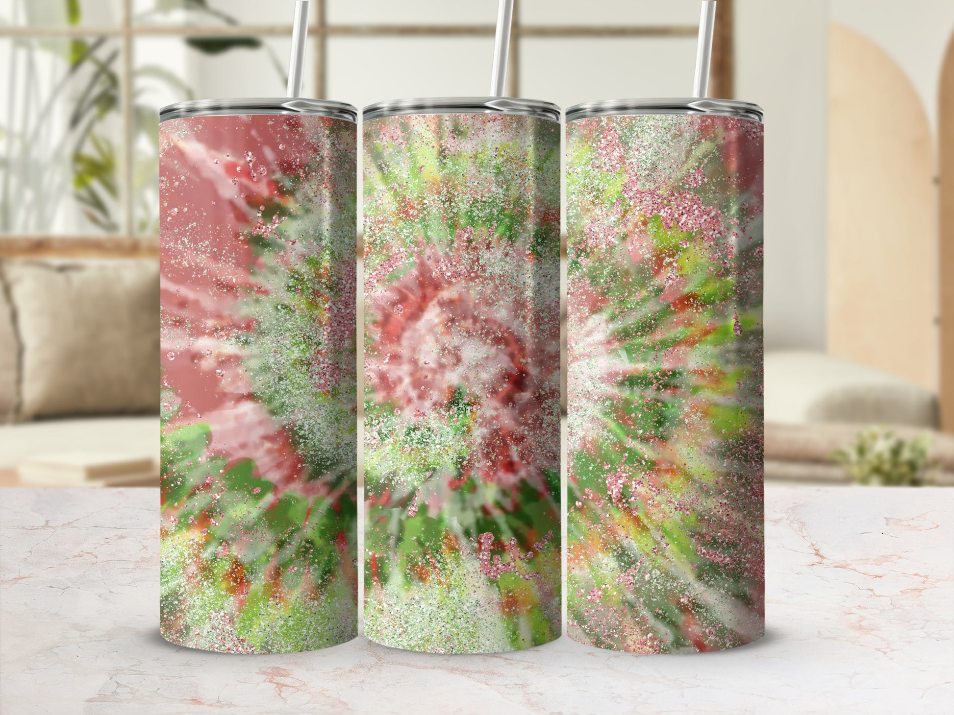Three tumblers with a pink and green tie-dye glitter design.
