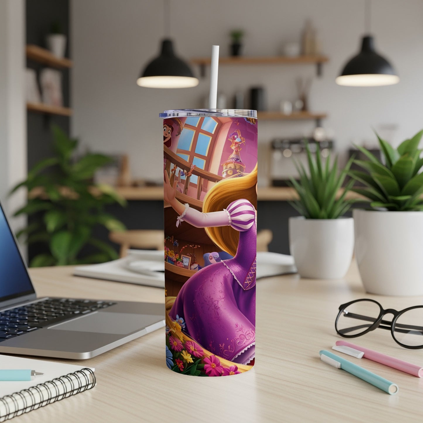 Rapunzel in a purple dress on a tumbler, leaning on a desk with laptop.