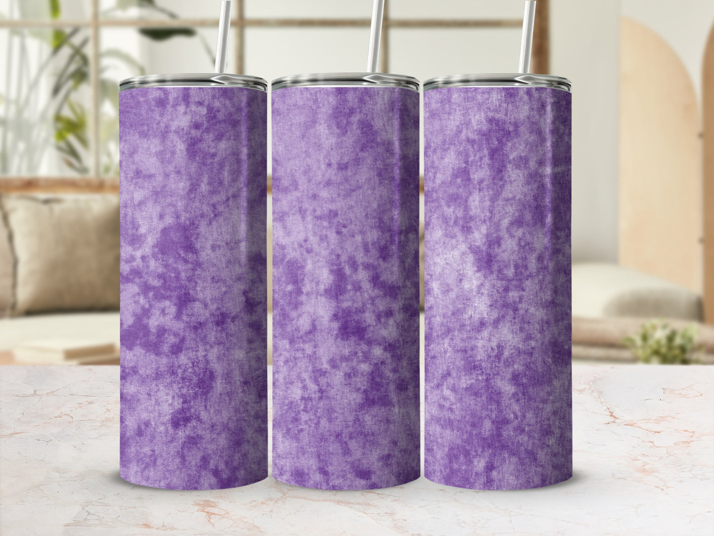 Three purple tumblers with a textured marble-like pattern and metal straws.