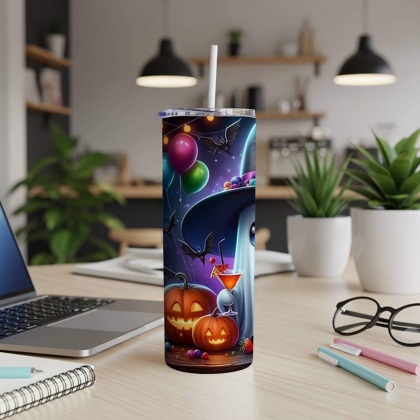 Halloween tumbler with ghost, pumpkins, bats, balloons, and spooky cocktail.