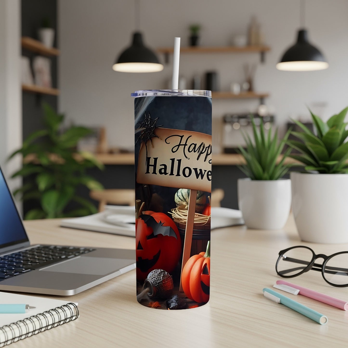 Tumbler with "Happy Halloween" sign, pumpkins, and spiderweb design.