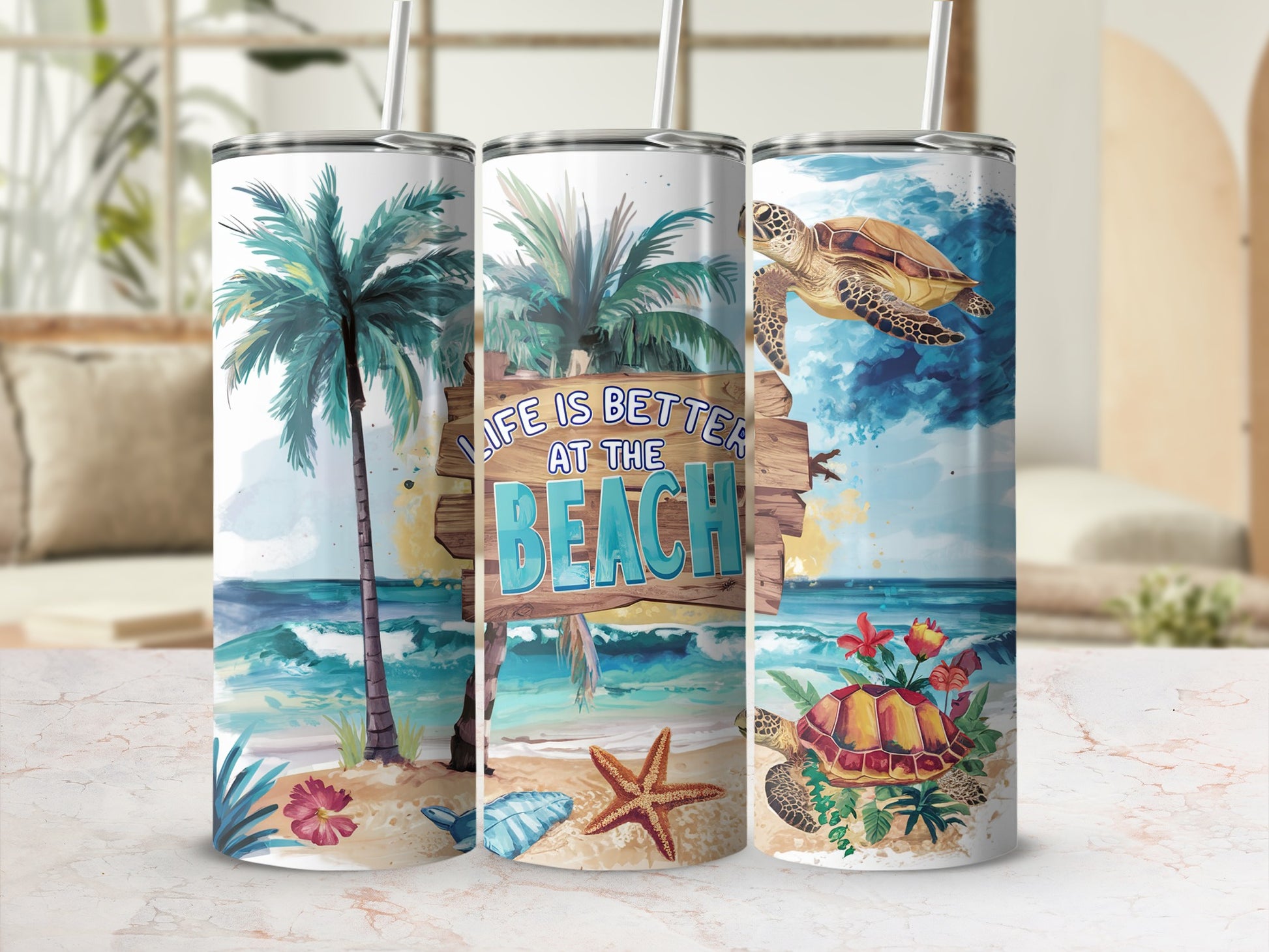 Three tumblers display a beach scene with sea turtles and palm trees.