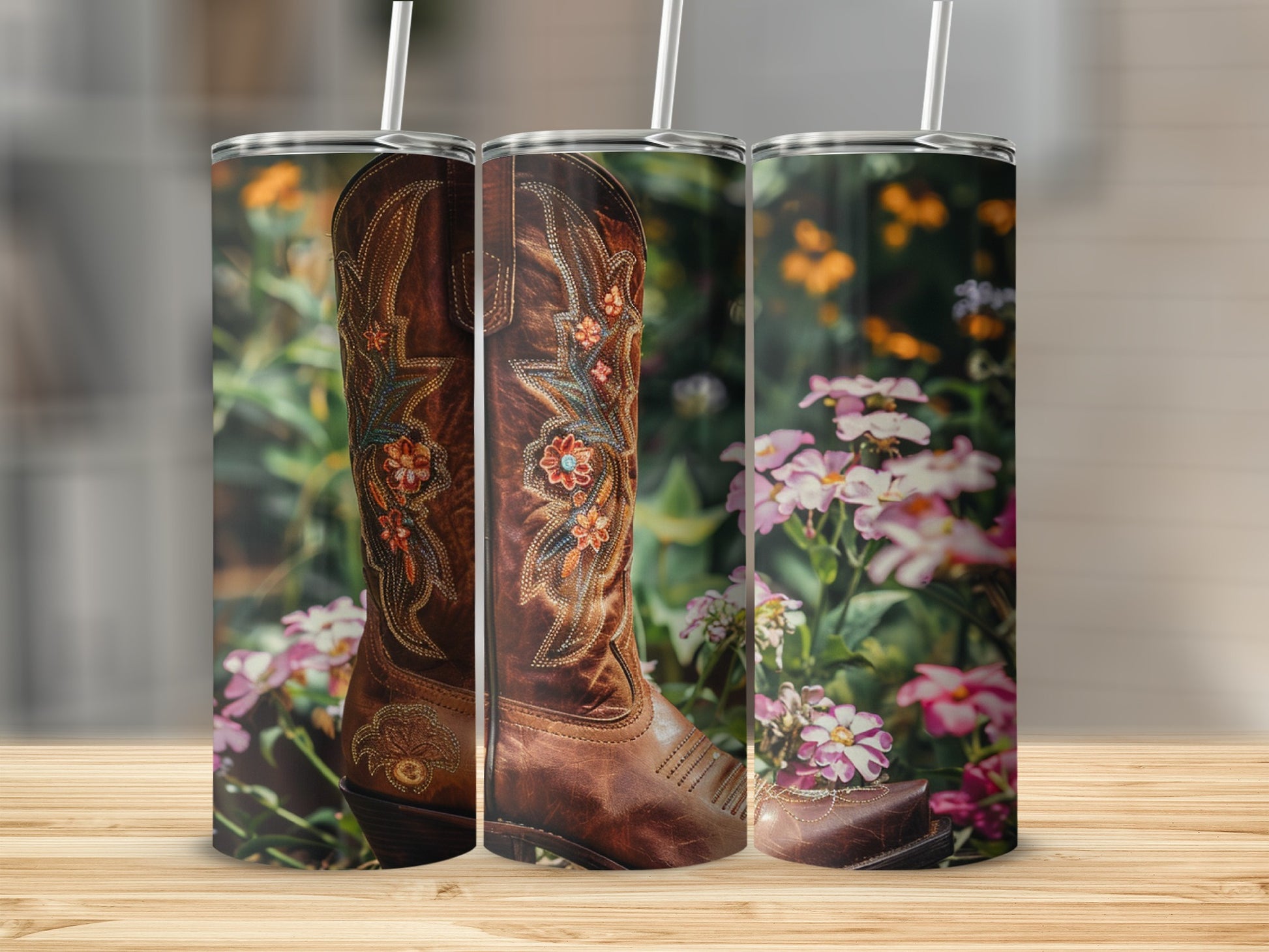 Brown leather cowboy boot with floral embroidery on a blurred floral background.